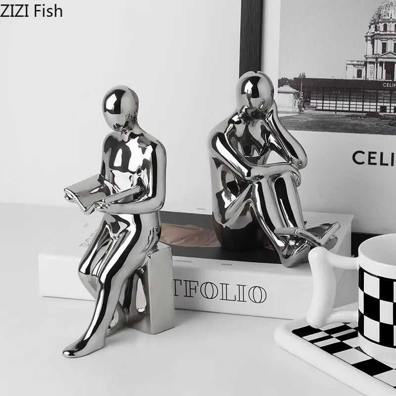Reggilibri in ceramica a forma di lettore – Sculture minimaliste per librerie e angoli di lettura
