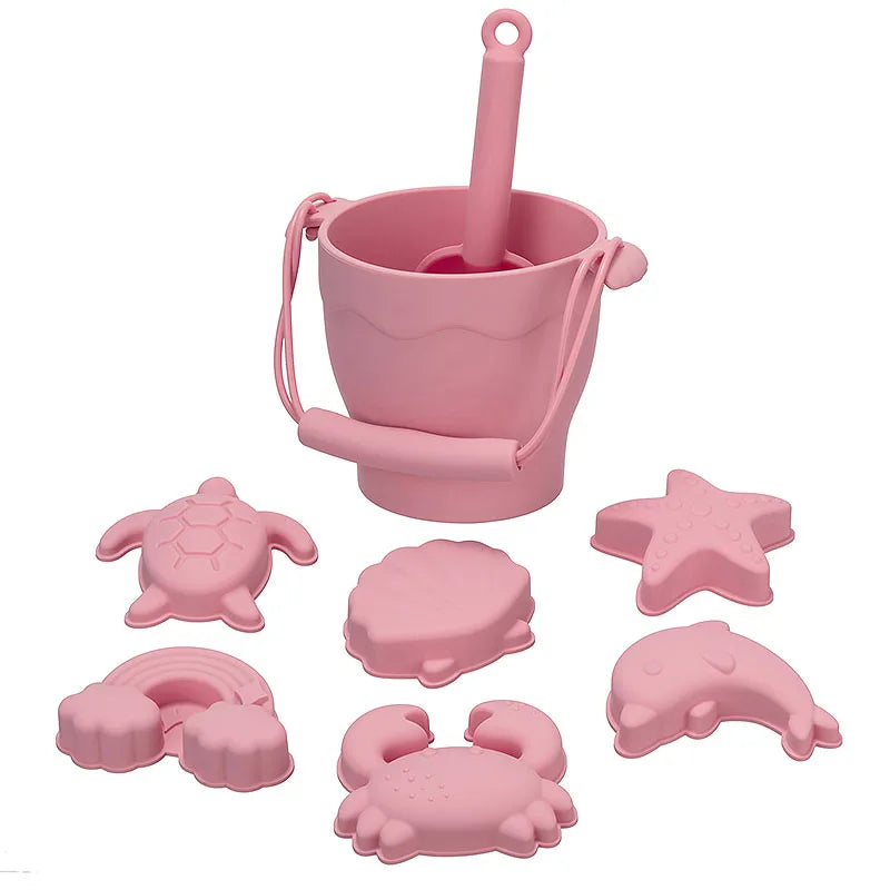 Set di giocattoli da spiaggia in silicone con secchiello e sei accessori