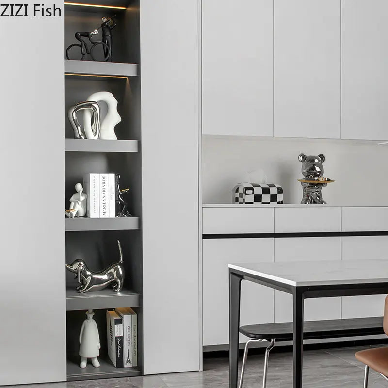 Reggilibri in ceramica a forma di lettore – Sculture minimaliste per librerie e angoli di lettura