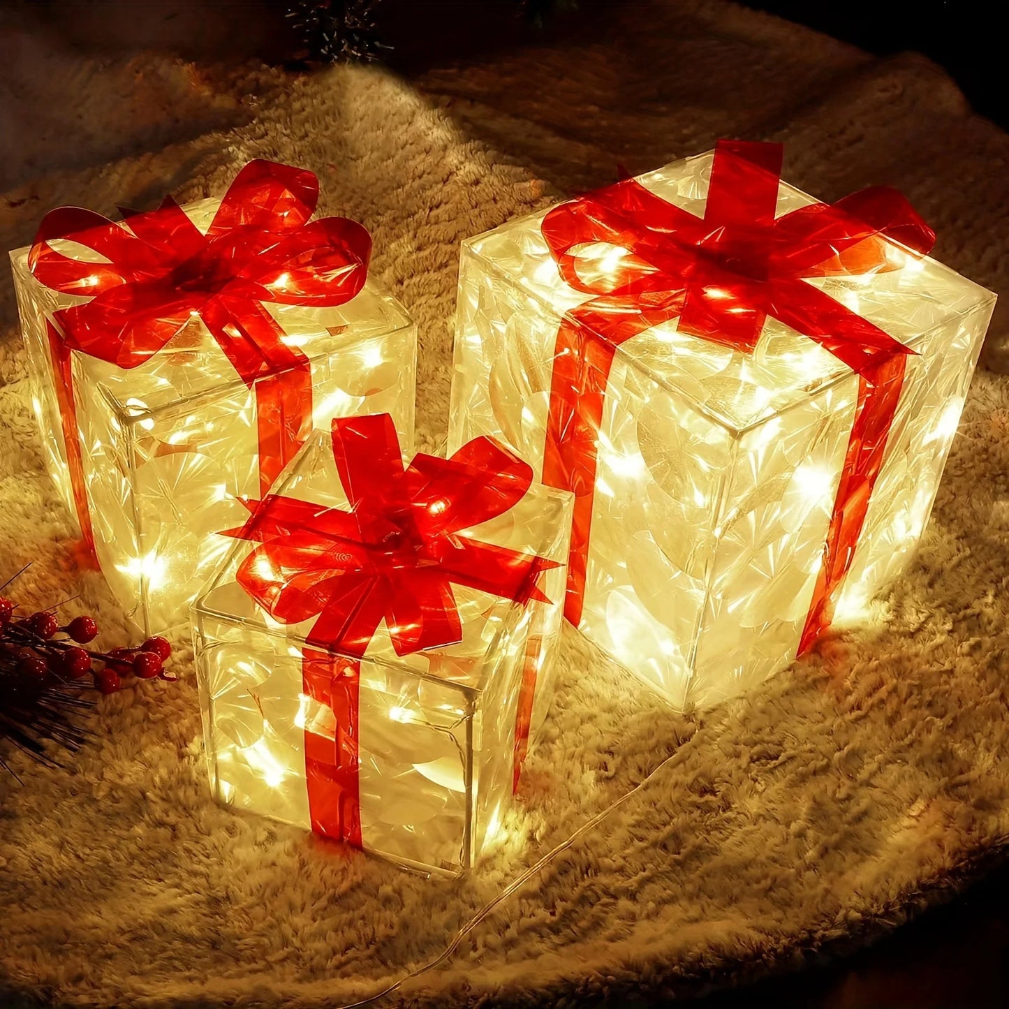 SET DI LUCI NATALIZIE, delicate e splendenti, che racchiudono la magia delle feste in un gioco di bagliori raffinati. Ogni confezione regalo, con il suo supporto luminoso rimovibile, diventa un piccolo scrigno di luce per dar